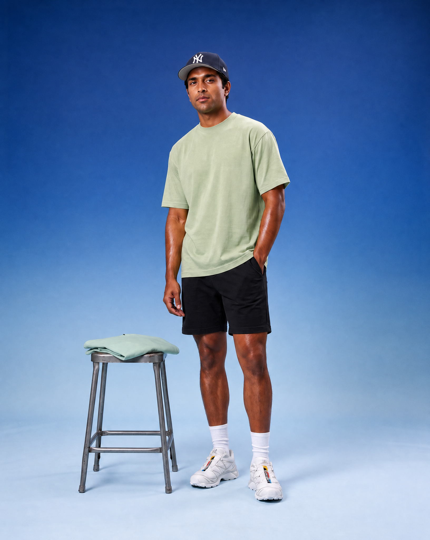 Generated_with_Kive.ai_-_Adjust_only_the_t-shirt_color_to_be_slightly_lighter_and_less_neon__shifting_from_bright_lime_to_a_softer_avocado_green_close_to_the_reference._Keep_the_chang.png